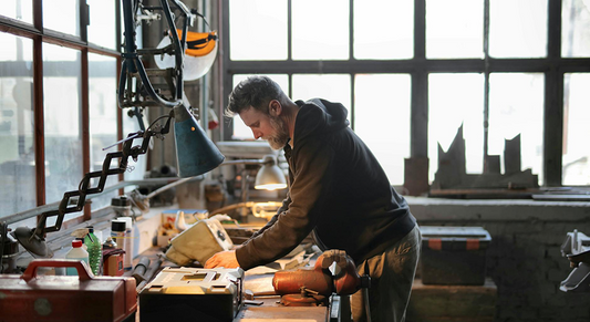Mechanic working in garage.